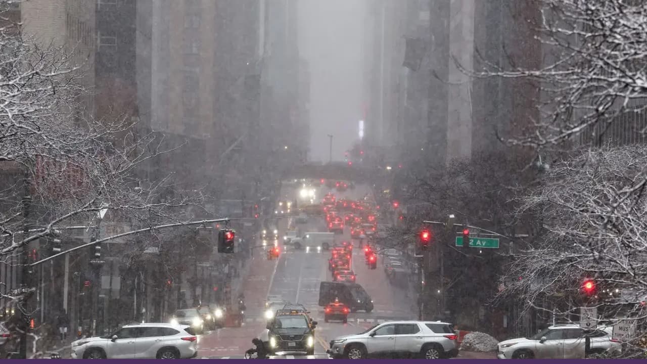 Snow-covered city street during severe Northeast blizzard
